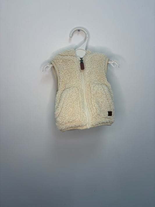 Veste moumoute sans manches