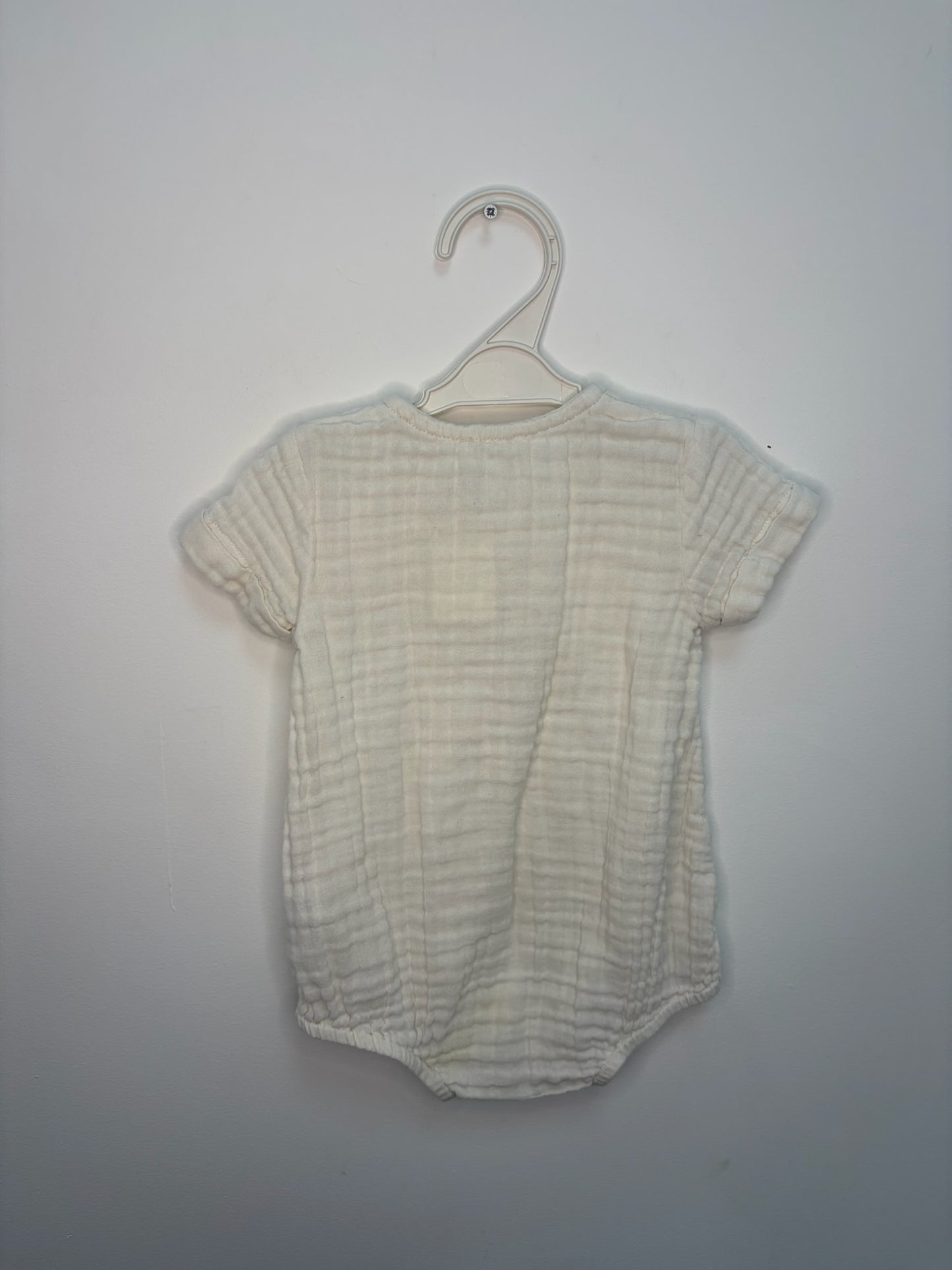 Petite barboteuse en gaz de coton